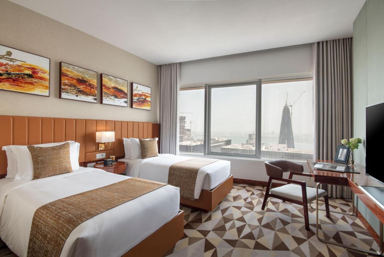 The Bentley Luxury Hotel & Suites Doha Exteriör bild Deluxe Room