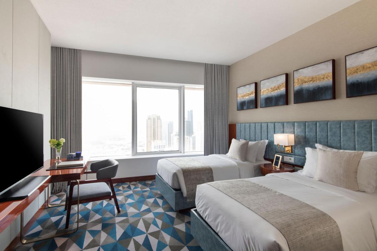 The Bentley Luxury Hotel & Suites Doha Exteriör bild Deluxe Room
